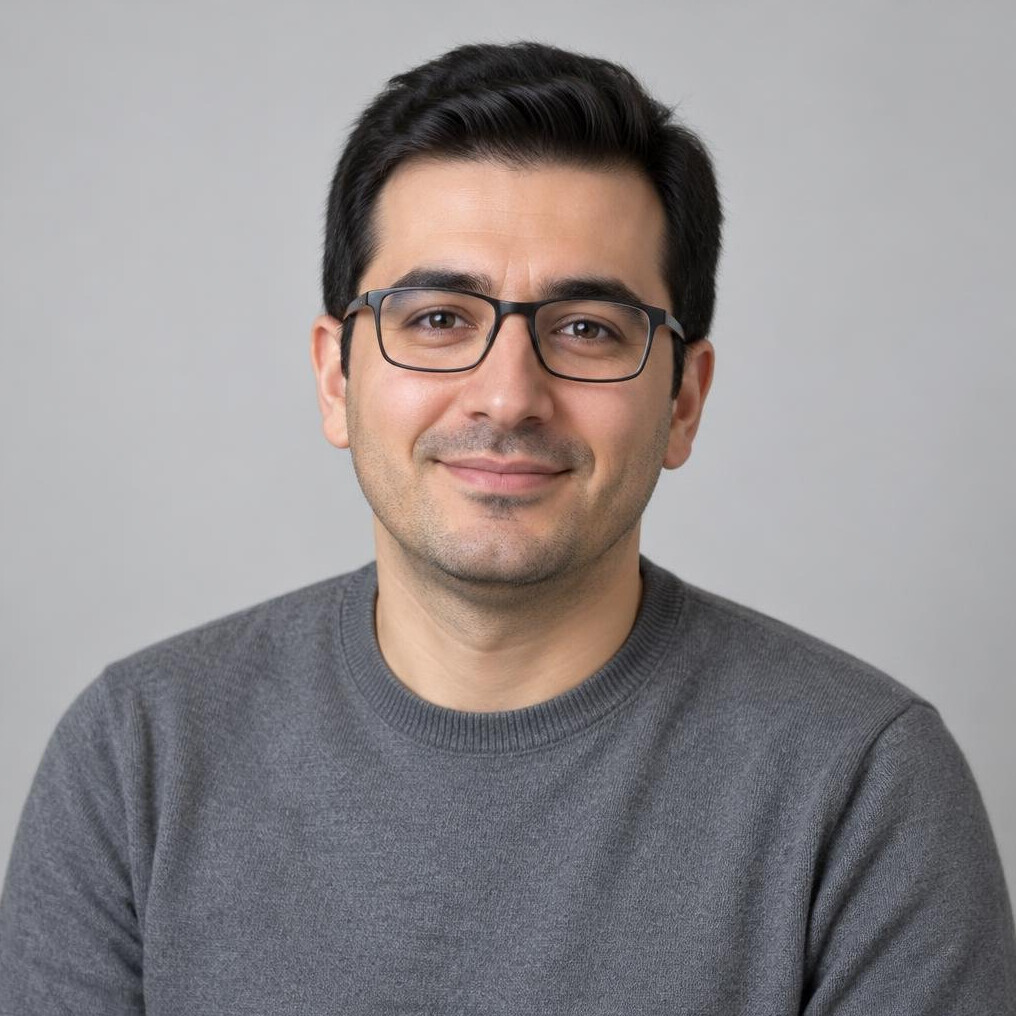 Portrait of a Turkish man in his 30s with glasses